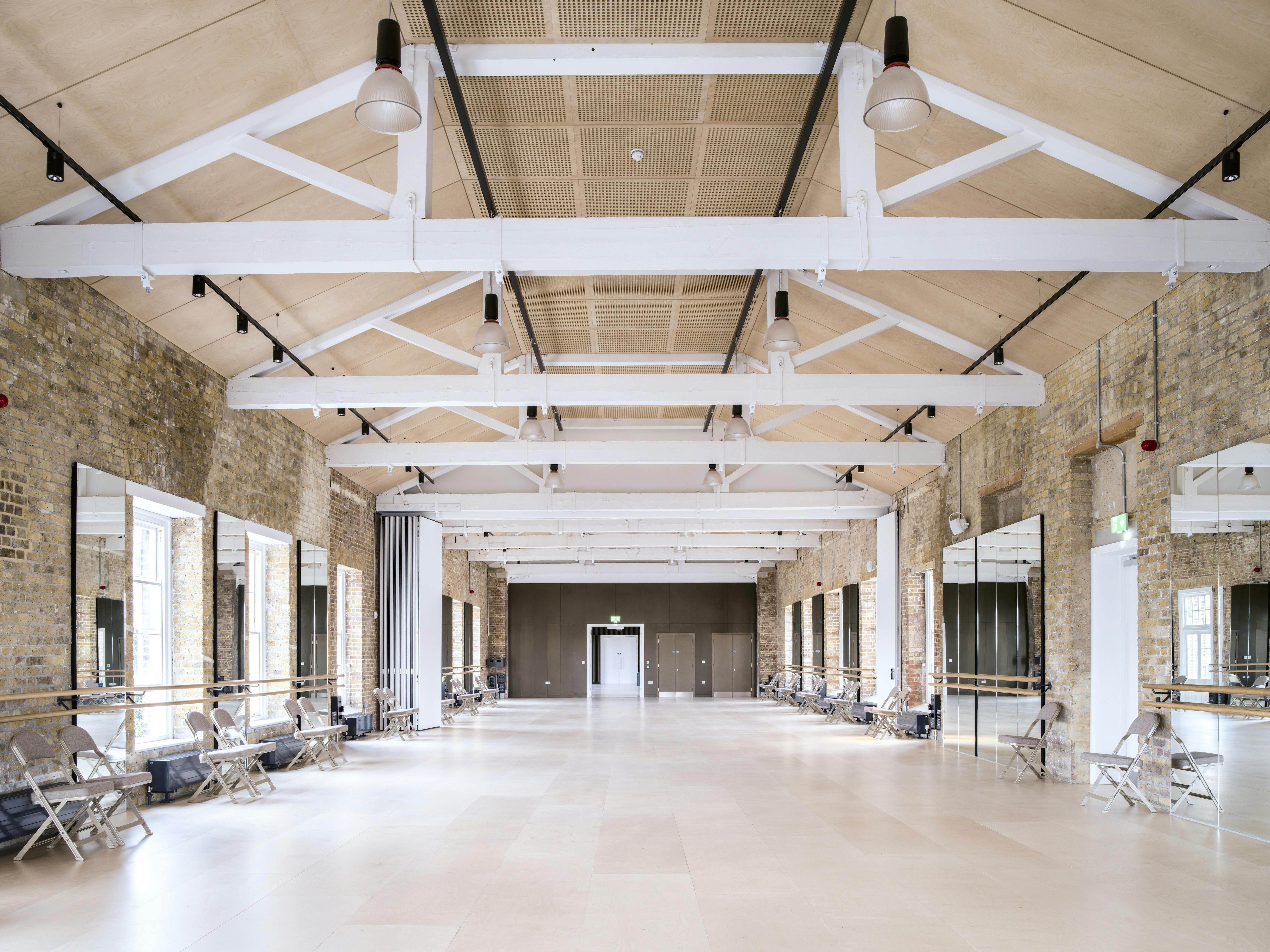 Spacious event venue with high ceilings, ideal for meetings and workshops in Woolwich.