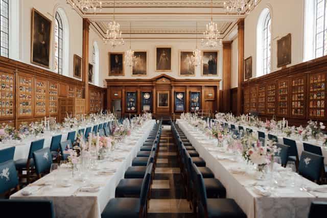 Elegant banquet hall with floral centerpieces, perfect for formal events and celebrations.