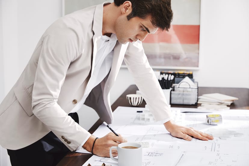 Professional reviewing event plans in organized Blender workspace, emphasizing meticulous preparation.