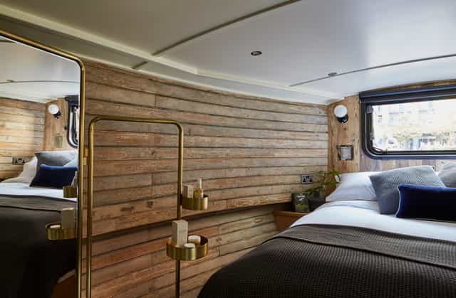 Boutique hotel boat in Paddington, featuring warm wooden walls for retreats and workshops.