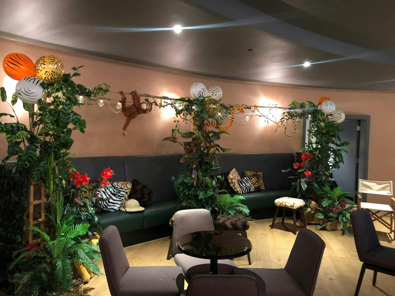 VUE West End Screen 6 lounge with tropical decor for events and gatherings.