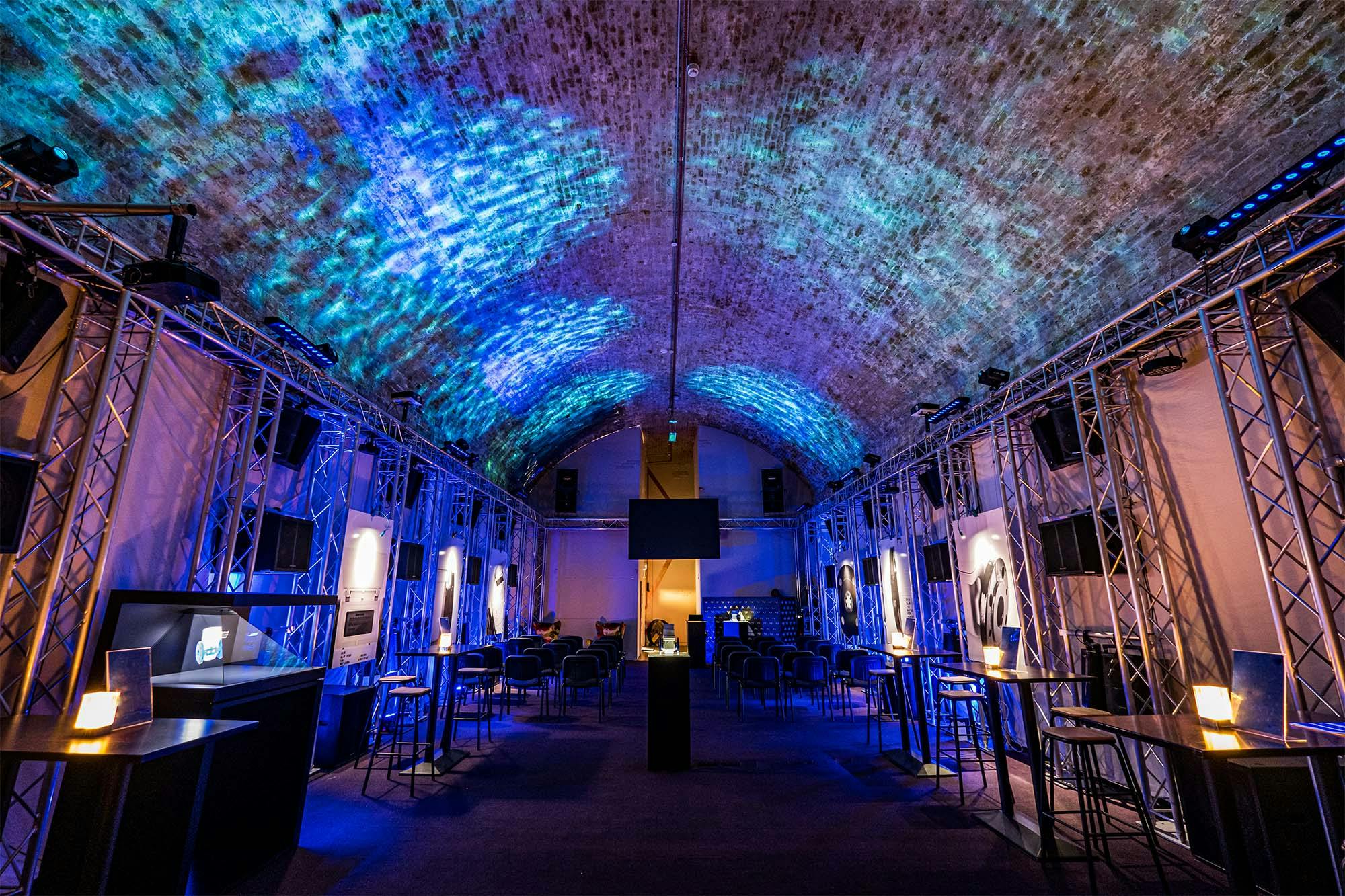 Versatile event space in Aures London with vaulted ceiling, ideal for corporate parties.