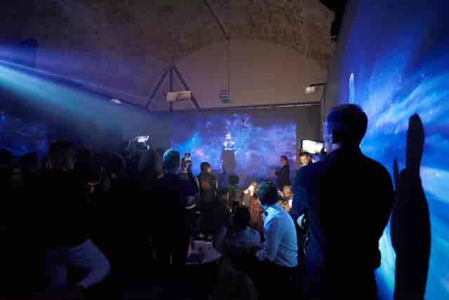 Dynamic event space in Aures London with speaker and immersive lighting for corporate parties.