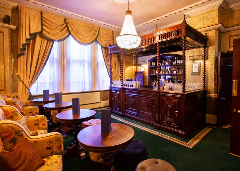 Cocktail bar in Cosy Club Nottingham, elegant decor for networking events and receptions.