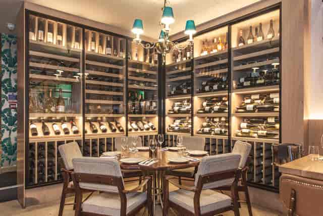 Elegant wine cellar in Meraki London, perfect for intimate gatherings and exclusive events.