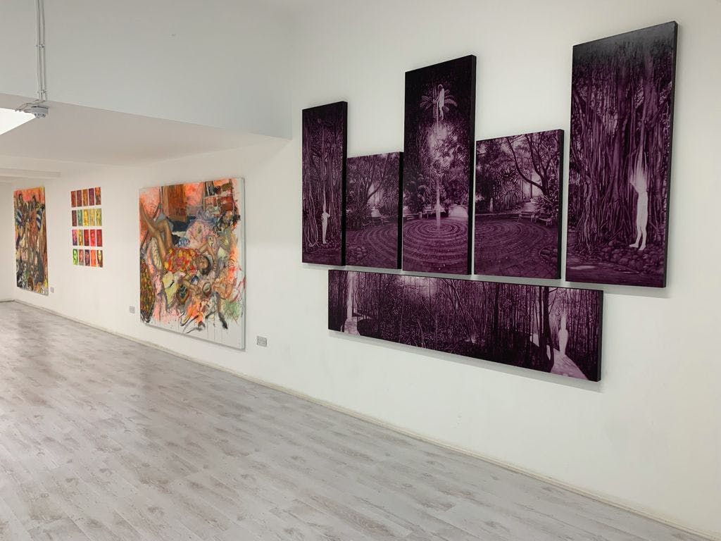 Contemporary art space with vibrant artwork, ideal for creative meetings and events.