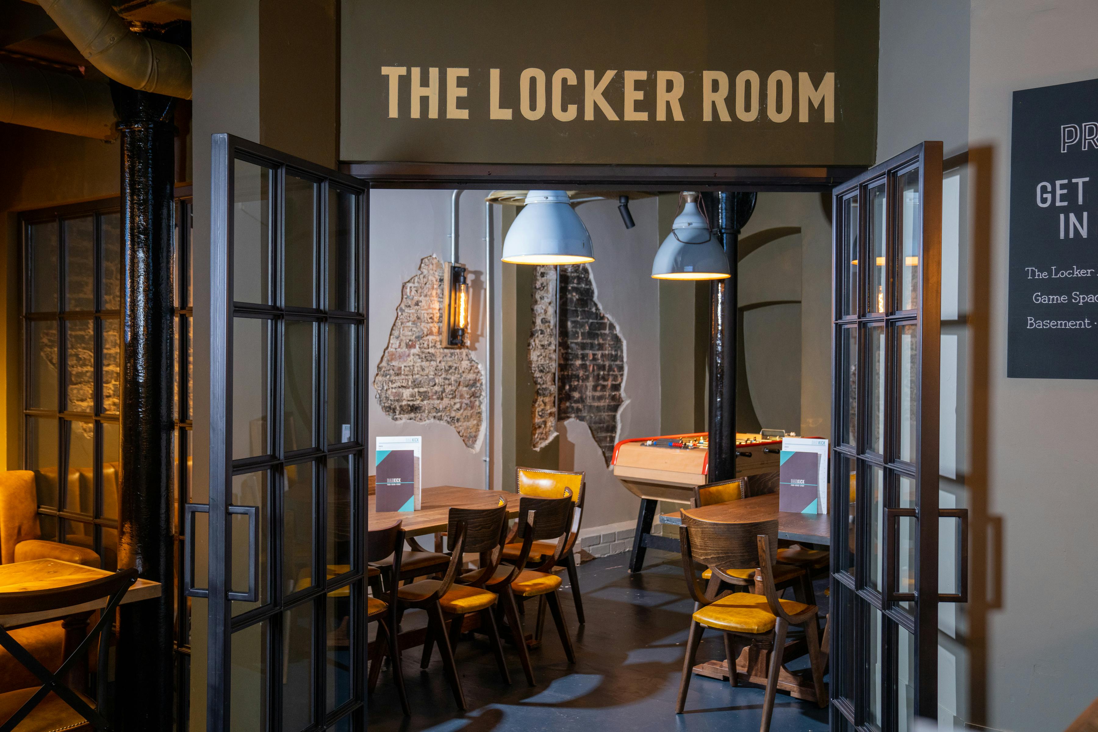 Stylish meeting space "The Locker Room" at Bar Kick, perfect for team-building events.