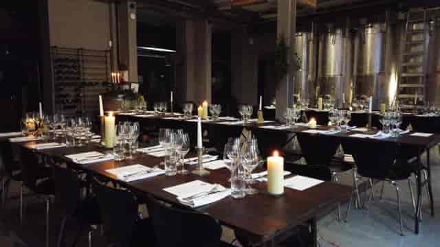 Elegant dining setup at Cru Urban Winery, perfect for gala dinners and corporate events.