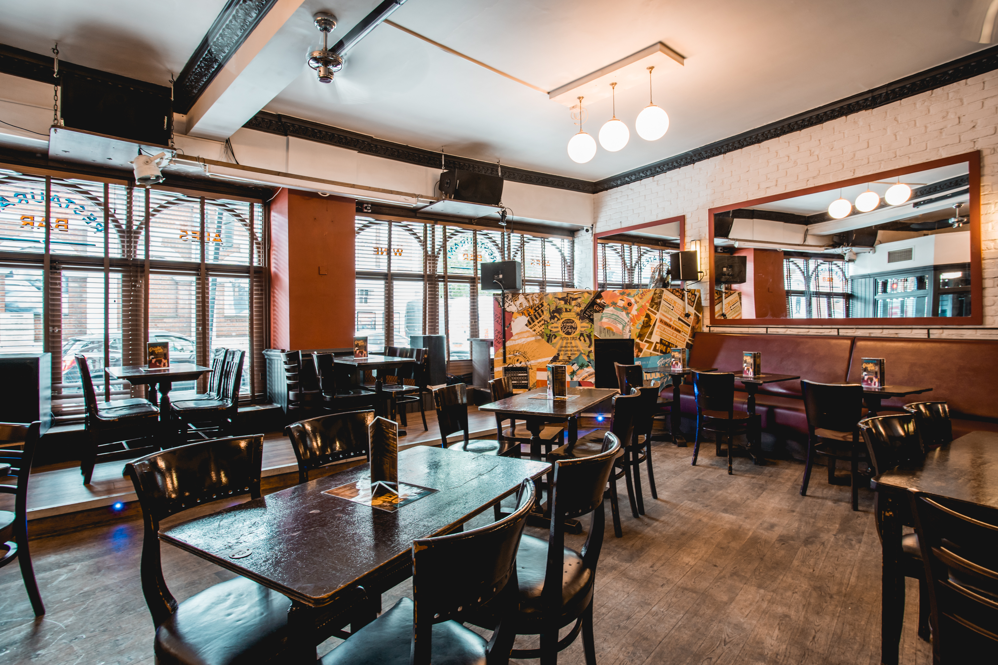 Prince Of Wales Pub event space with natural light, ideal for networking and meetings. - Banner