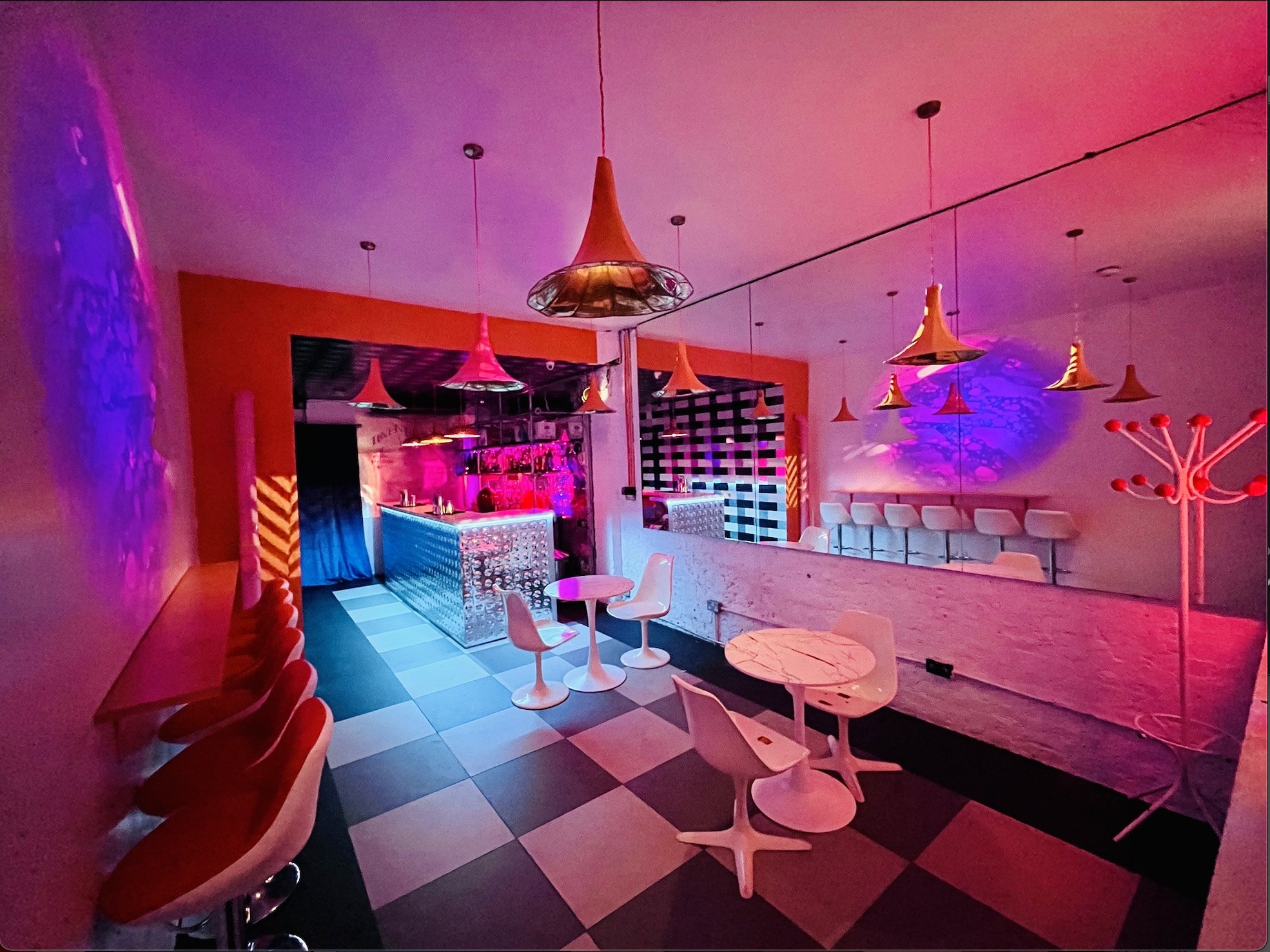 Vibrant Bonkers Bar event space with modern furnishings for networking and cocktail receptions. - Banner