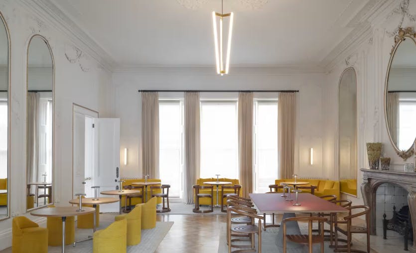 Cromwell Place Café Bar: stylish meeting space with modern furnishings for events and gatherings.