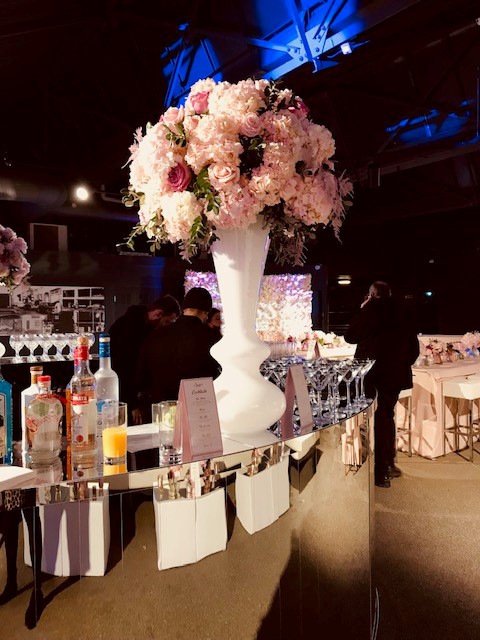 Elegant floral arrangement in The Showroom, perfect for upscale events and celebrations. - Banner