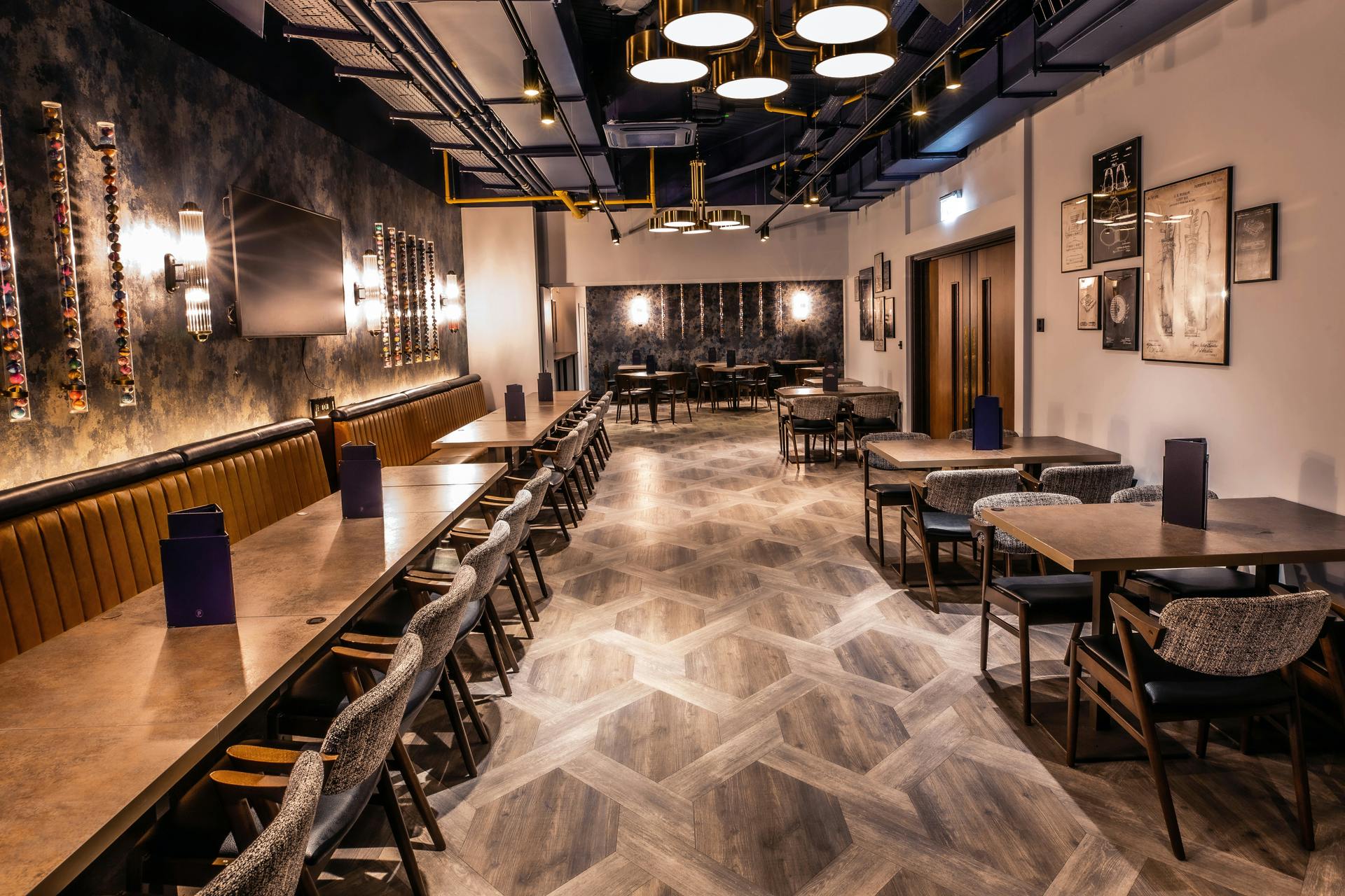 Modern event space with stylish layout in Jade Private Room, Puttshack Watford.