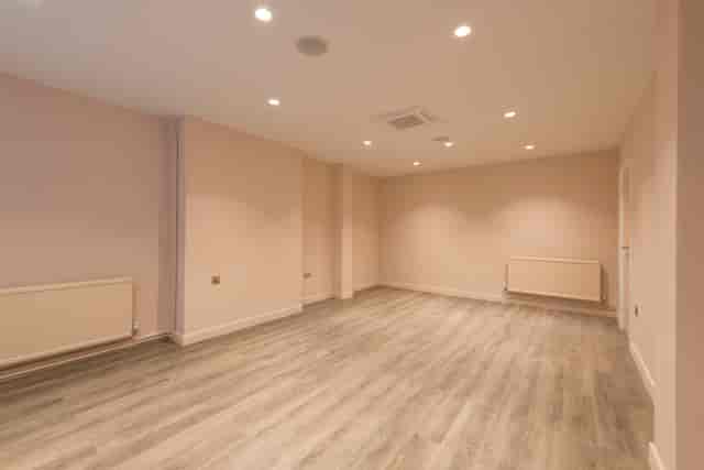 Bright, empty meeting space ideal for workshops and gatherings.