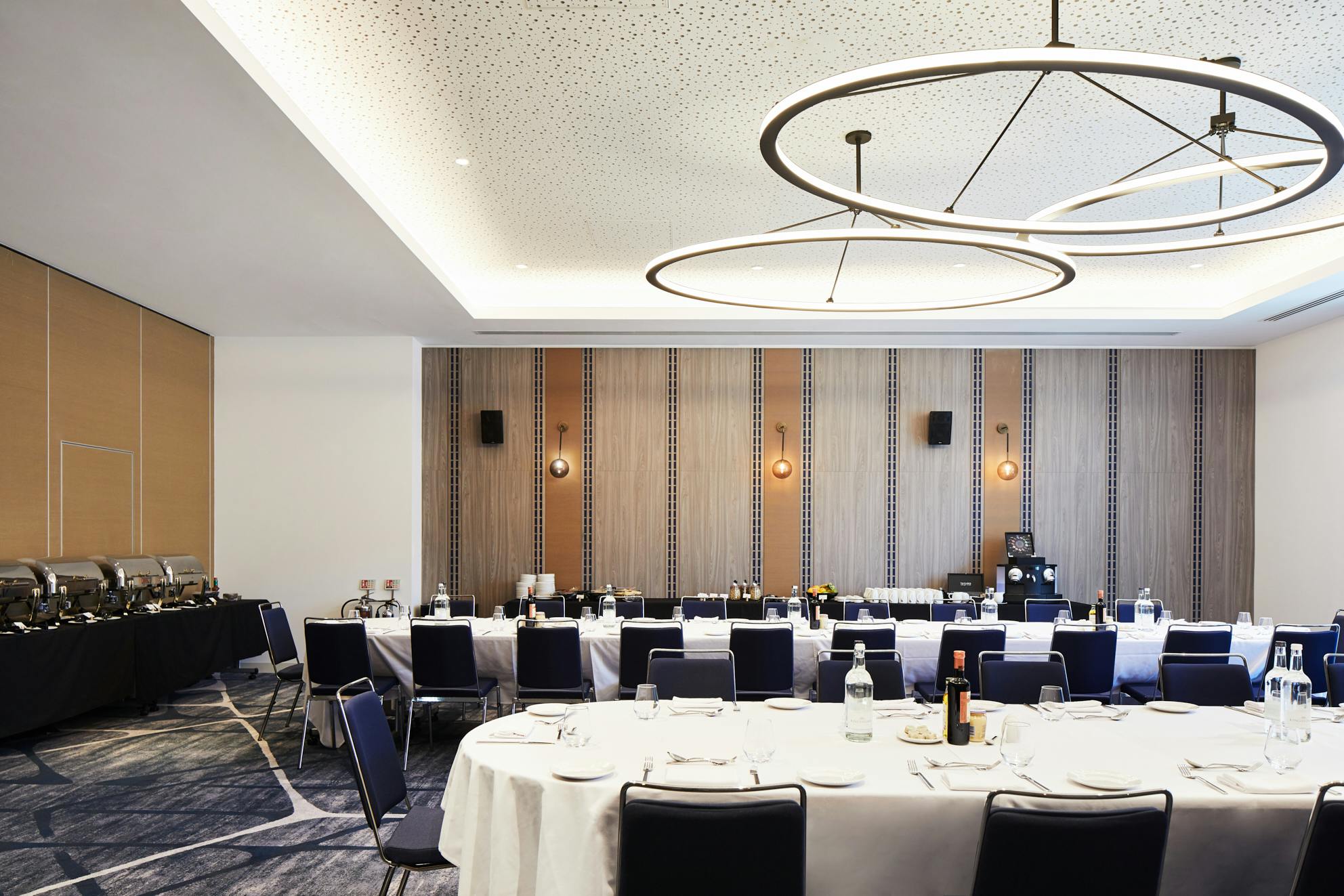 Hyatt Regency Manchester meeting room with elegant round tables for events and catering.