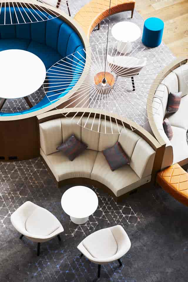 Stylish seating area in Hyatt Regency Manchester for networking and meetings.