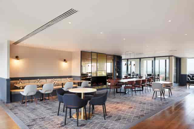 18th Floor Lounge at Hyatt Regency Manchester, modern event space with large windows.