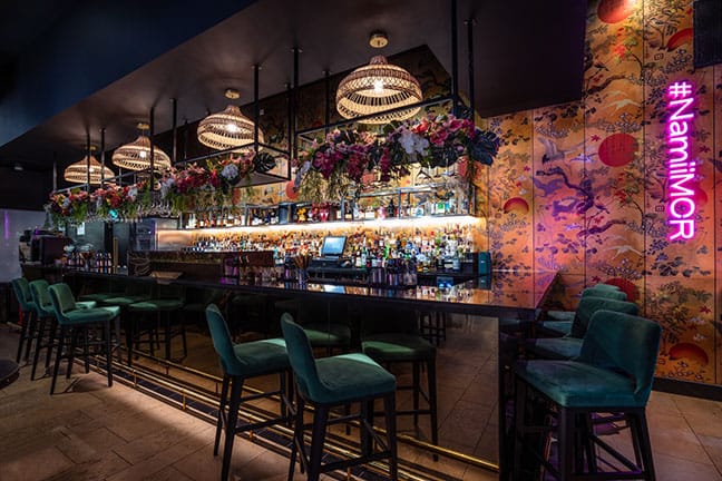 Stylish bar at Namii Kitchen & Cocktails, perfect for networking events and receptions.