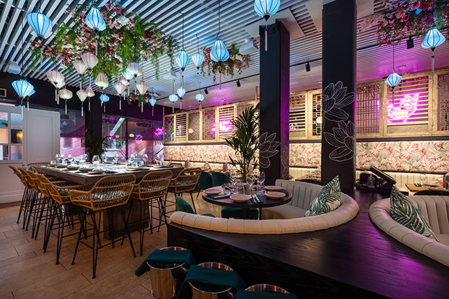 Vibrant Namii Kitchen & Cocktails event space with modern decor for gatherings and meetings. - Banner
