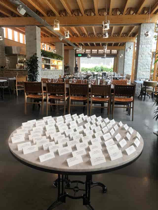 Upscale event seating with elegant place cards in The Greenroom for networking gatherings.
