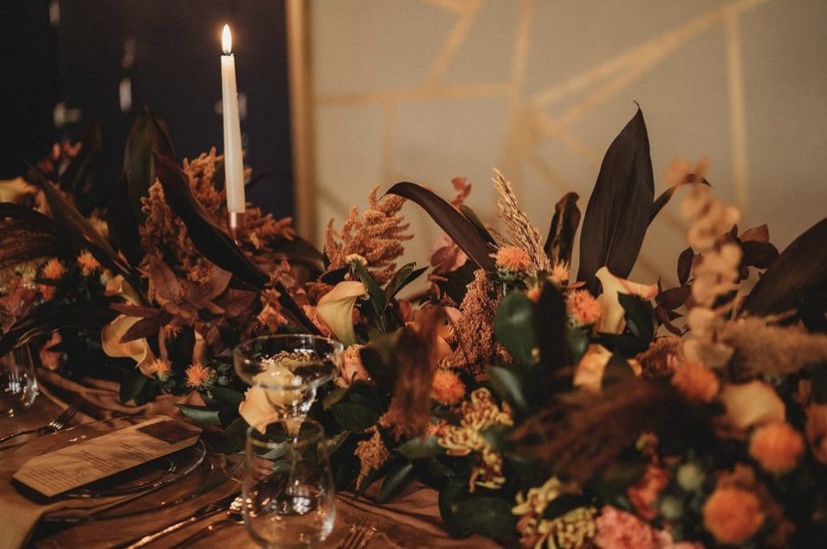 Sophisticated gala dinner tablescape with autumnal florals at The Venue on Middle St. - Banner