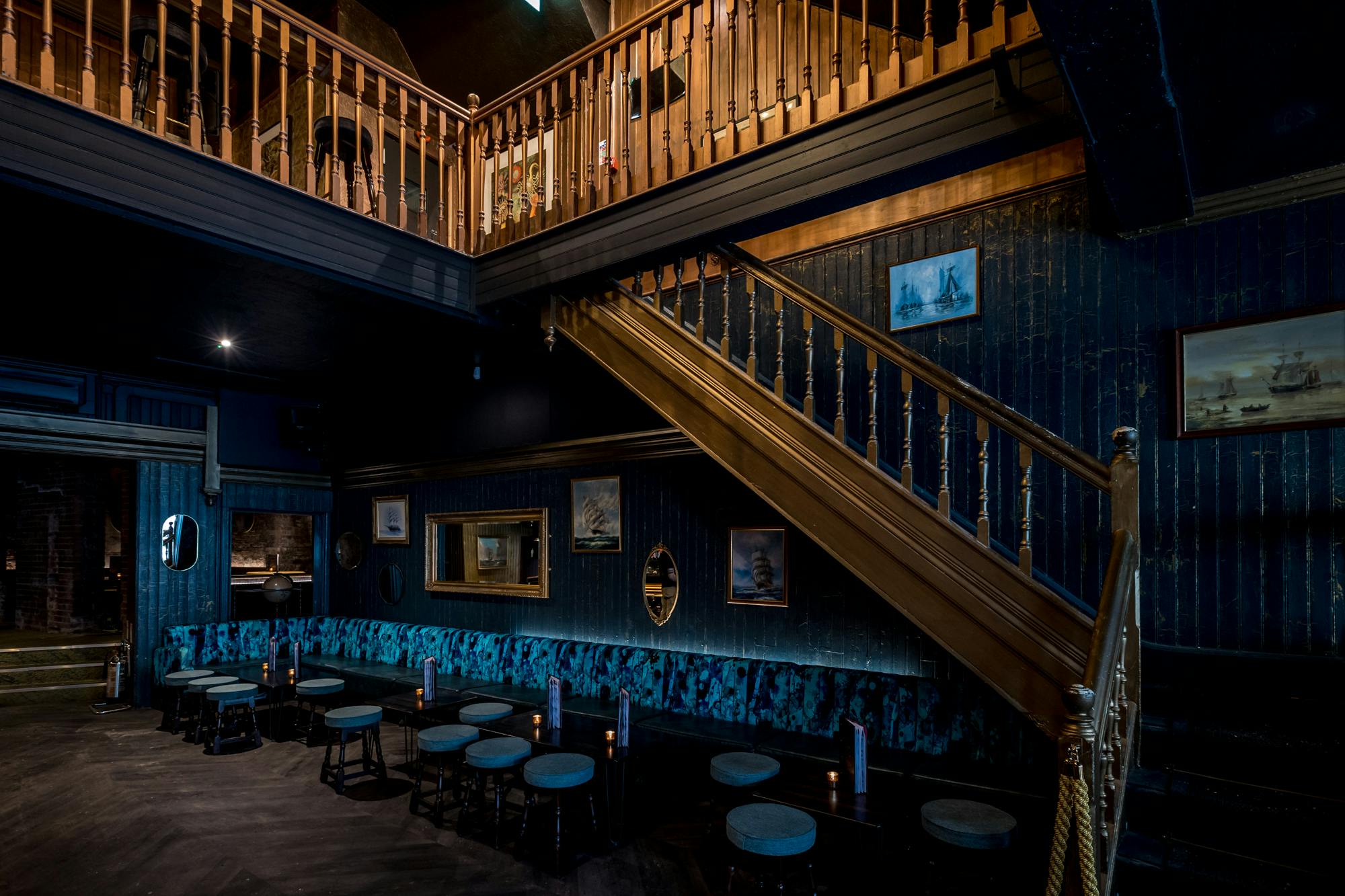 Stylish venue with staircase, ideal for networking events and gatherings in Exeter.