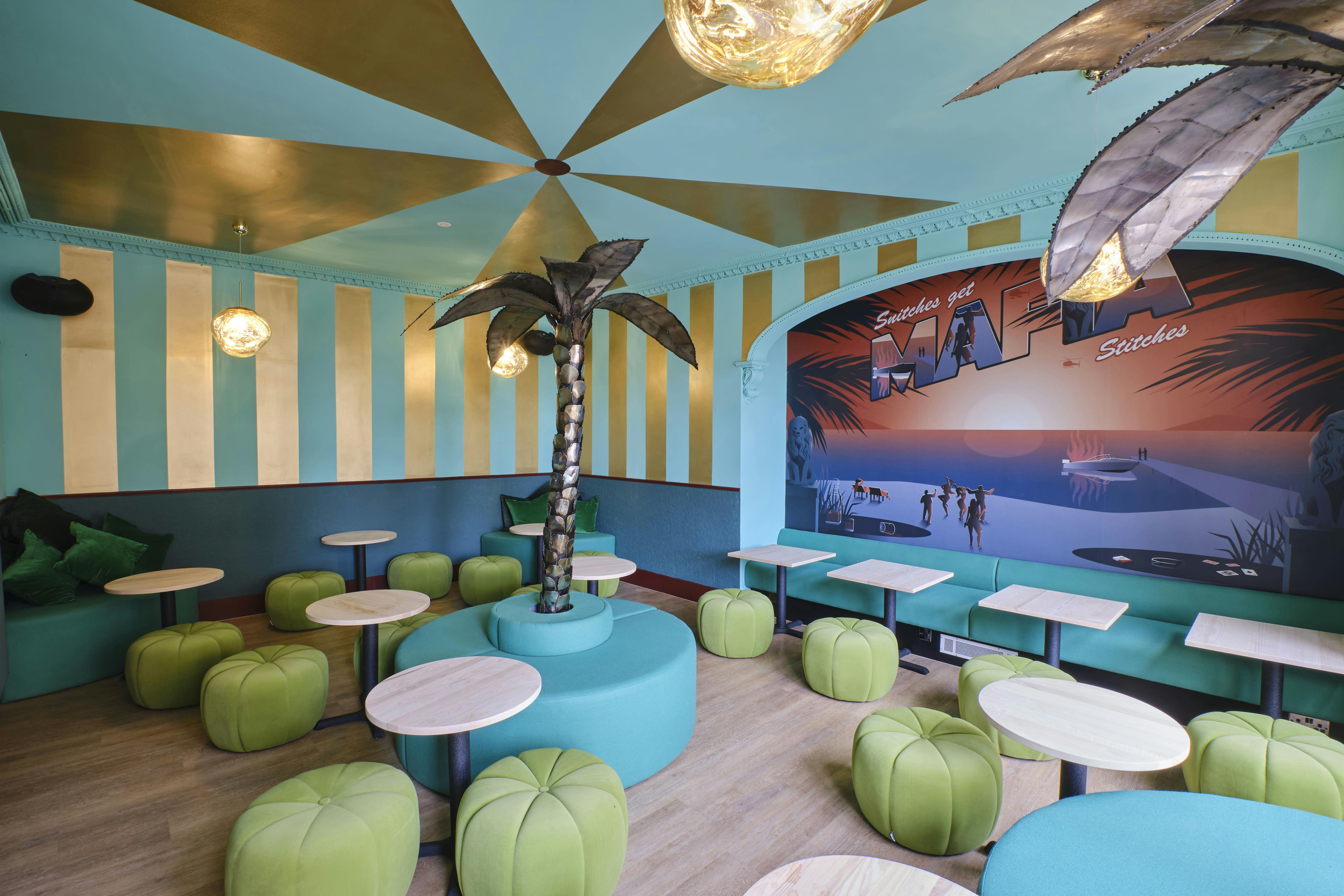 Vibrant Miami Bay event space with tropical decor for casual meetings and gatherings.