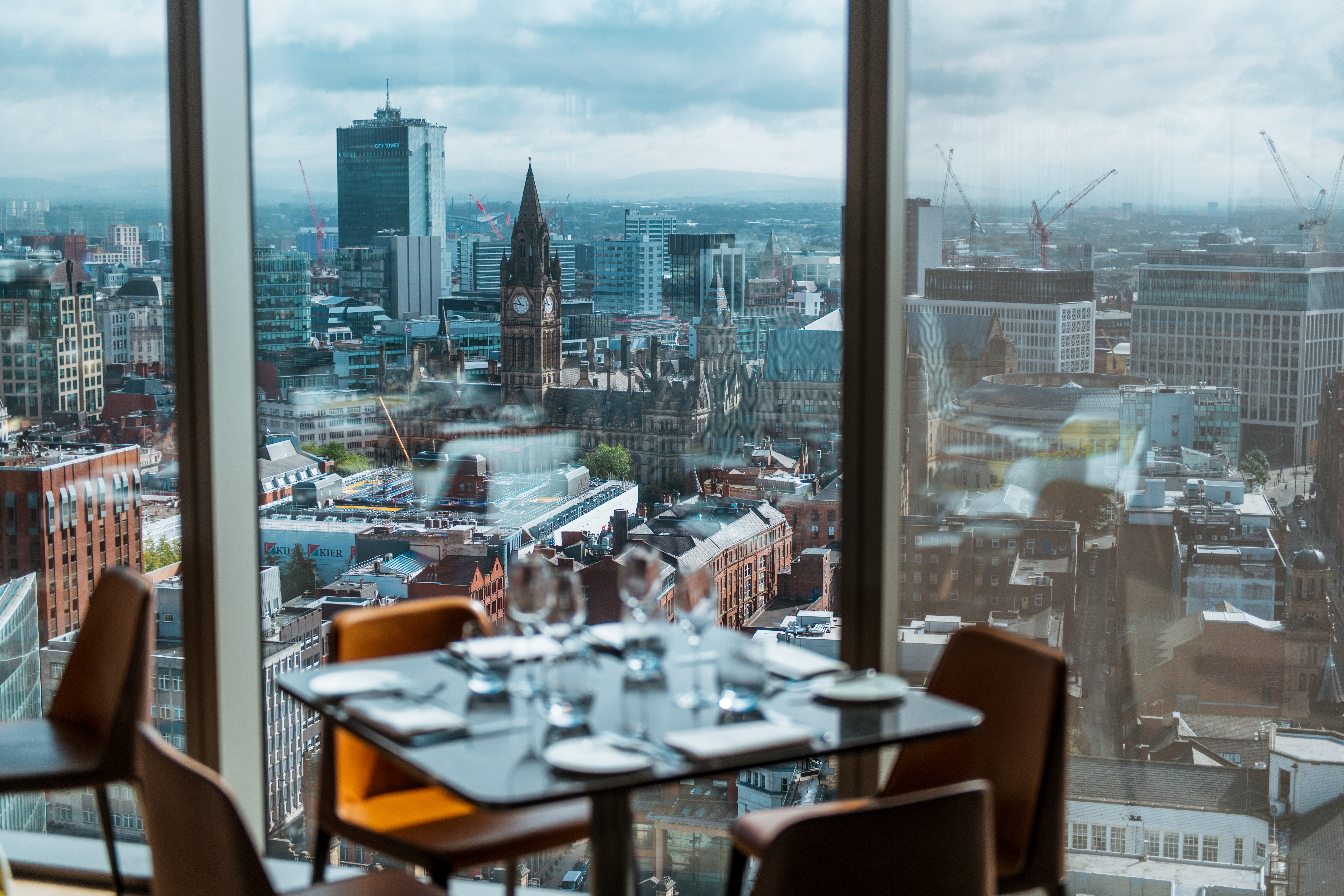 "Grill Hire at 20 Stories Restaurant with cityscape view for upscale corporate events." - Banner