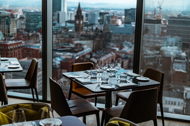 Grill Hire at 20 Stories Restaurant with elegant dining setup and cityscape view for corporate events.