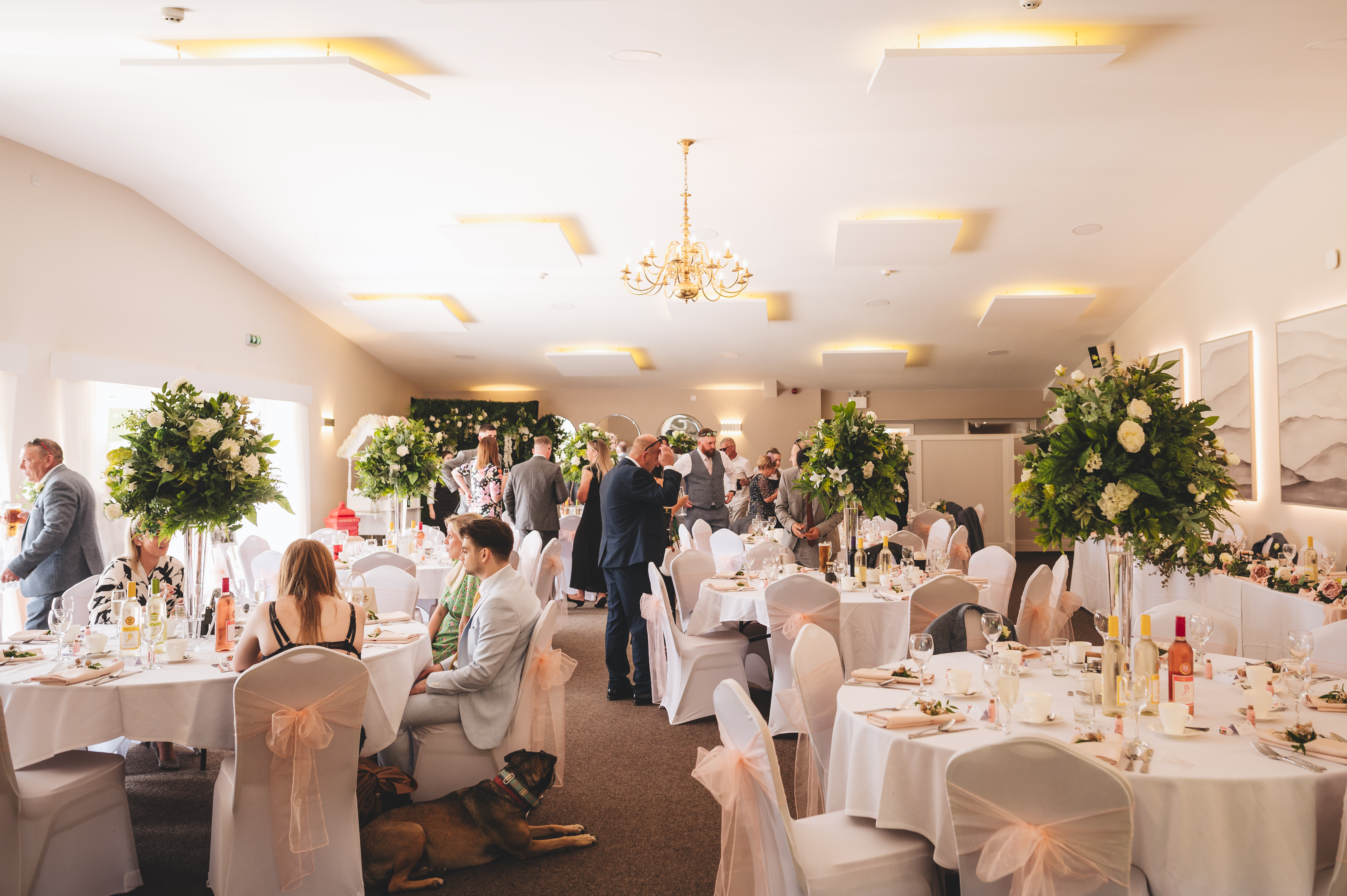 Eaton Manor Events Centre: elegant wedding venue with floral centerpieces and soft lighting. - Banner