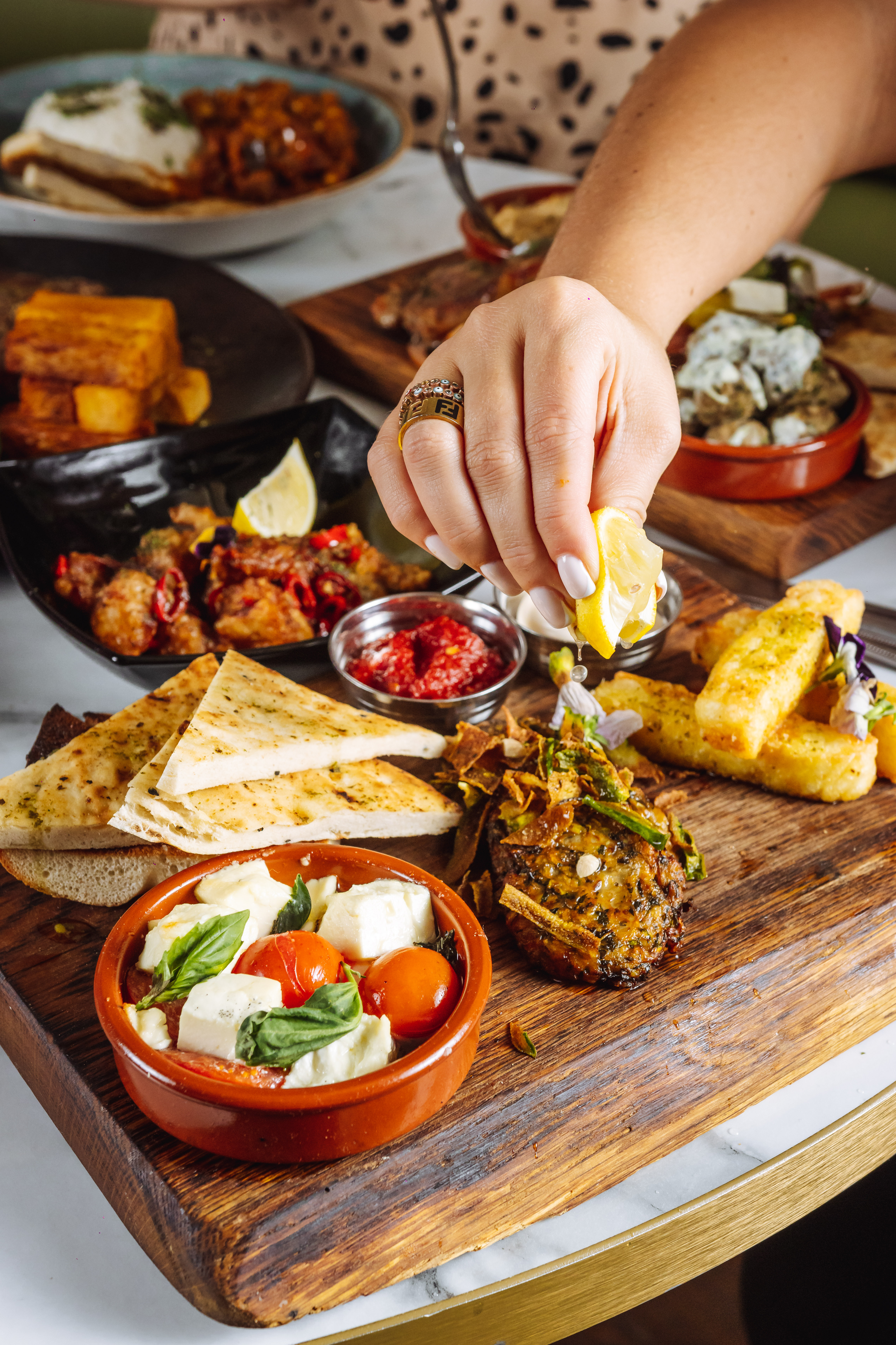 Gourmet dishes with vibrant colors for upscale events at Mezzanine, BLVD Spinningfields.