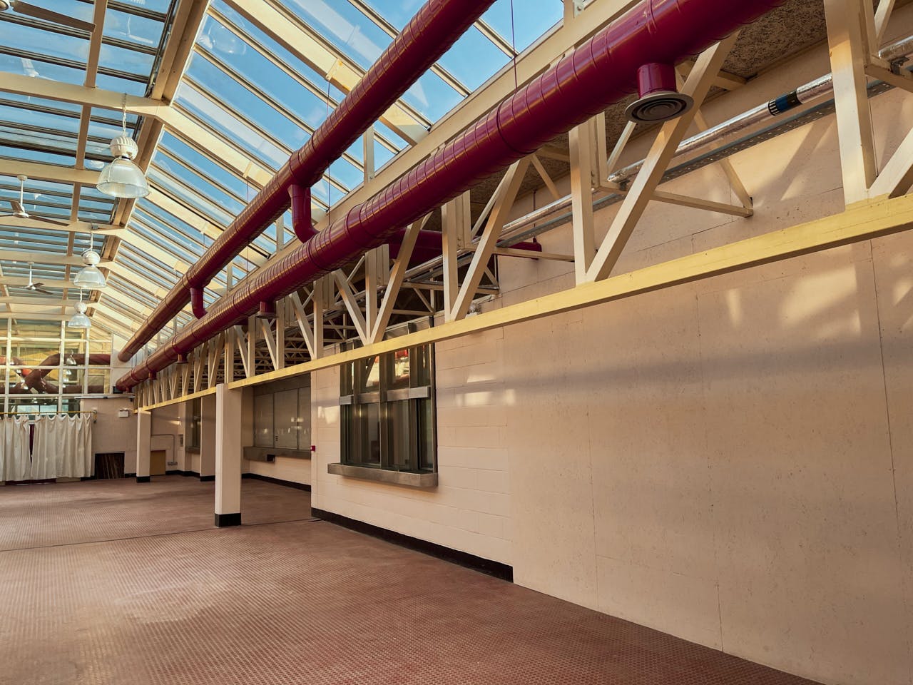 Hackney Depot Main Hall: spacious venue with high ceilings for events and gatherings.