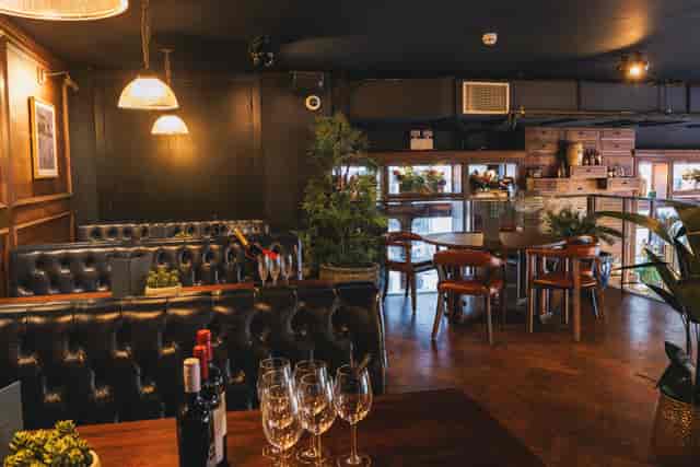 Intimate venue with dark wood accents for small meetings and private events.