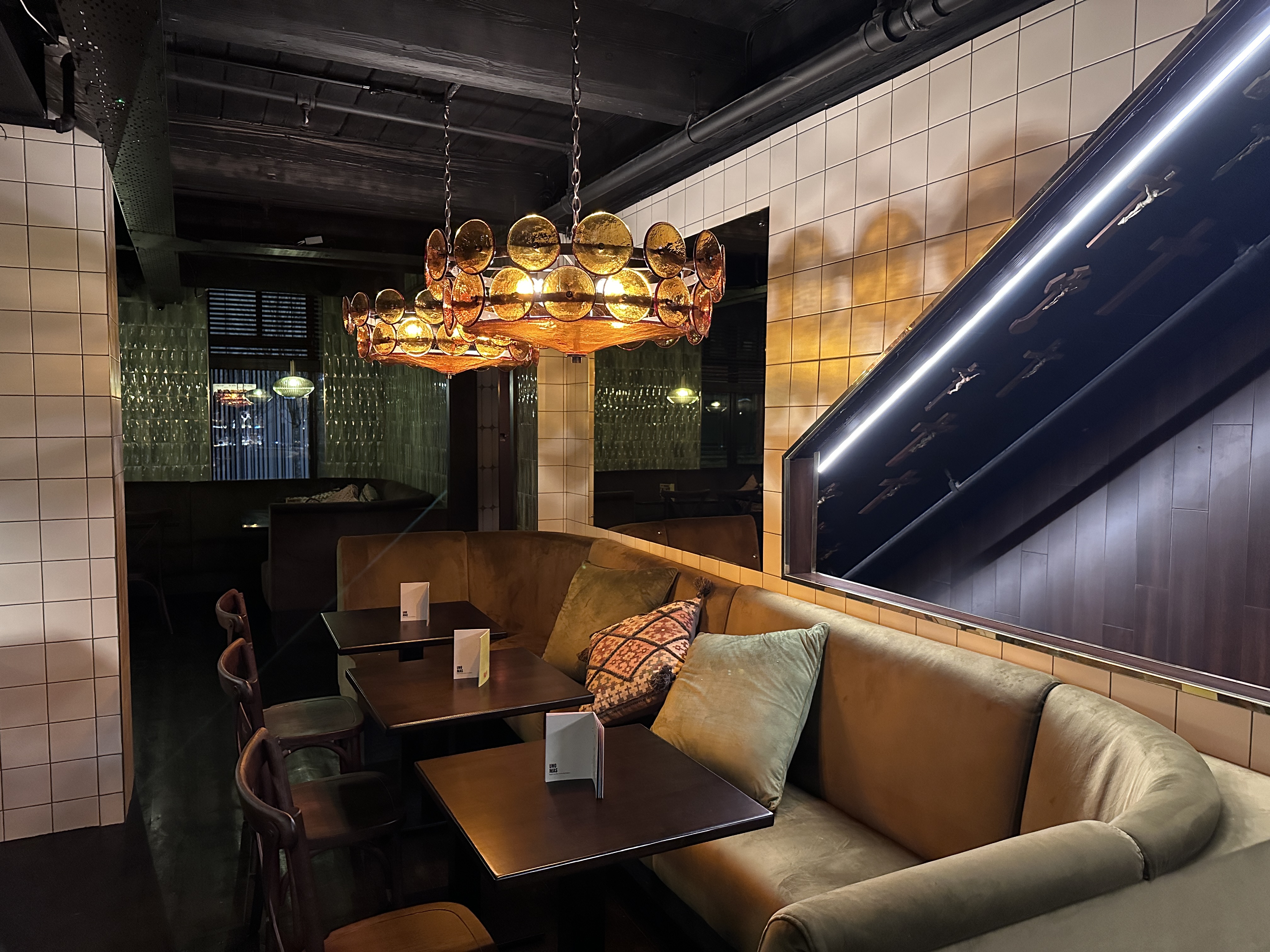 Stylish dining space at Boogalú for intimate meetings and private events. - Banner