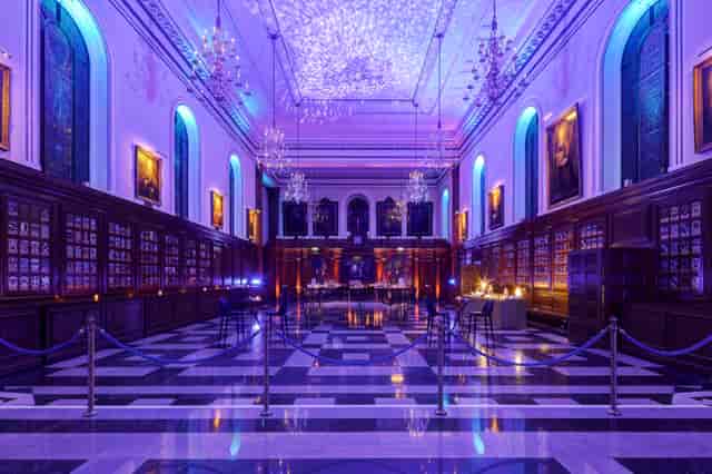 Inner Temple Hall with purple uplighting for a premium cocktail reception or gala venue.