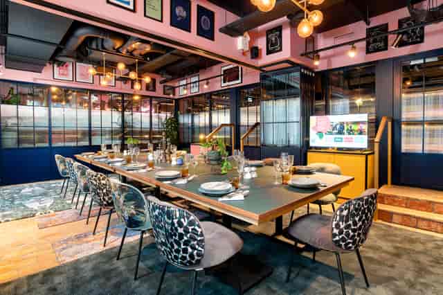Stylish meeting space at Yotel Manchester for corporate events with modern decor.