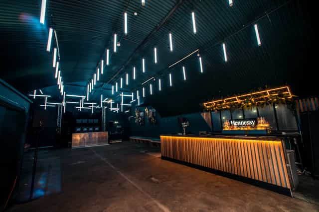 Modern event space at The Club in Night Tales with LED lighting for gatherings.