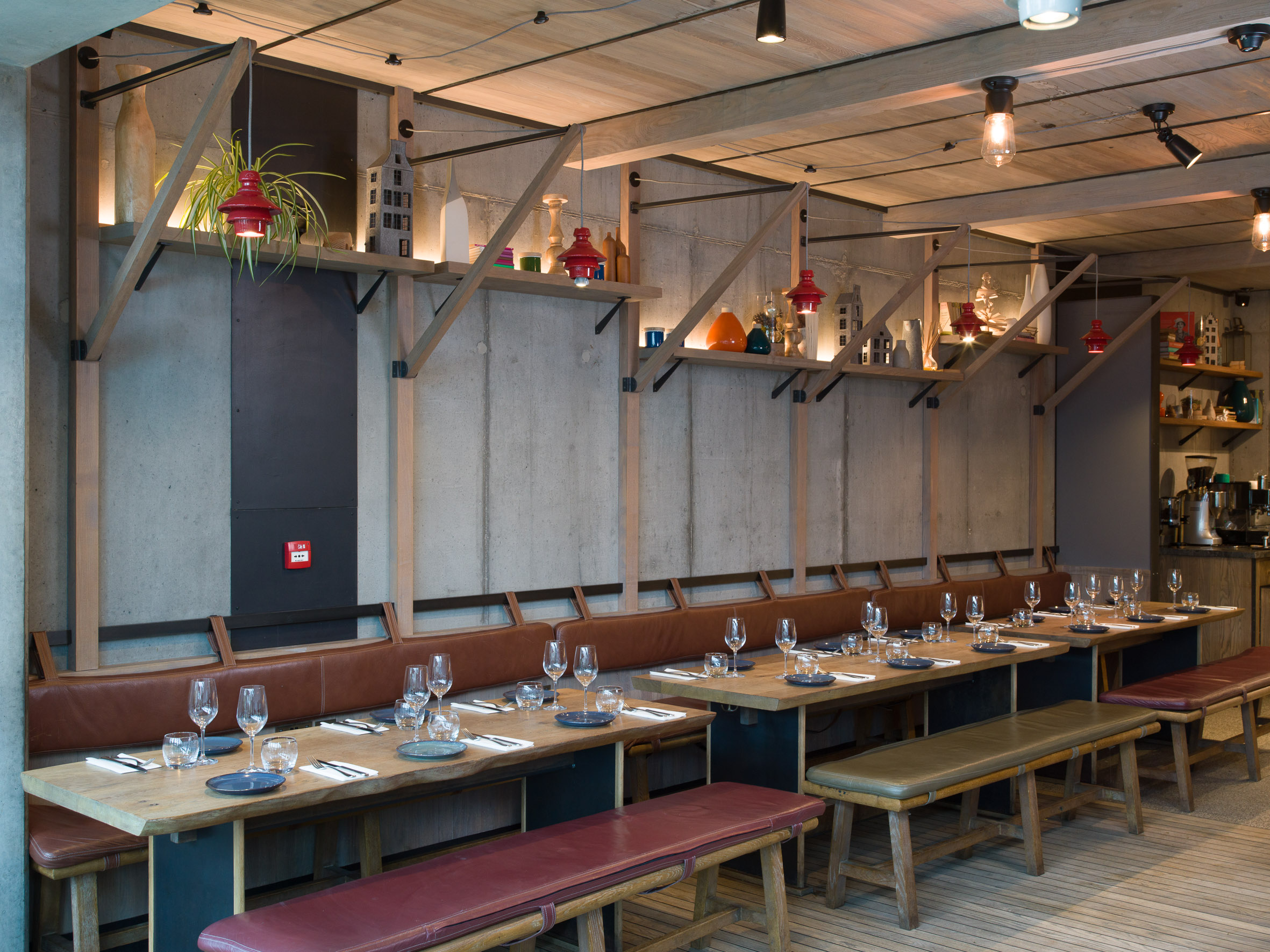Modern Canalside dining space with elegant tableware, perfect for networking events.