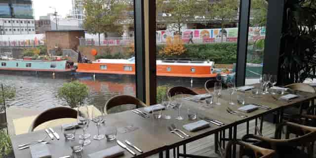 Elegant dining table at The Lighterman, perfect for events by waterfront views.