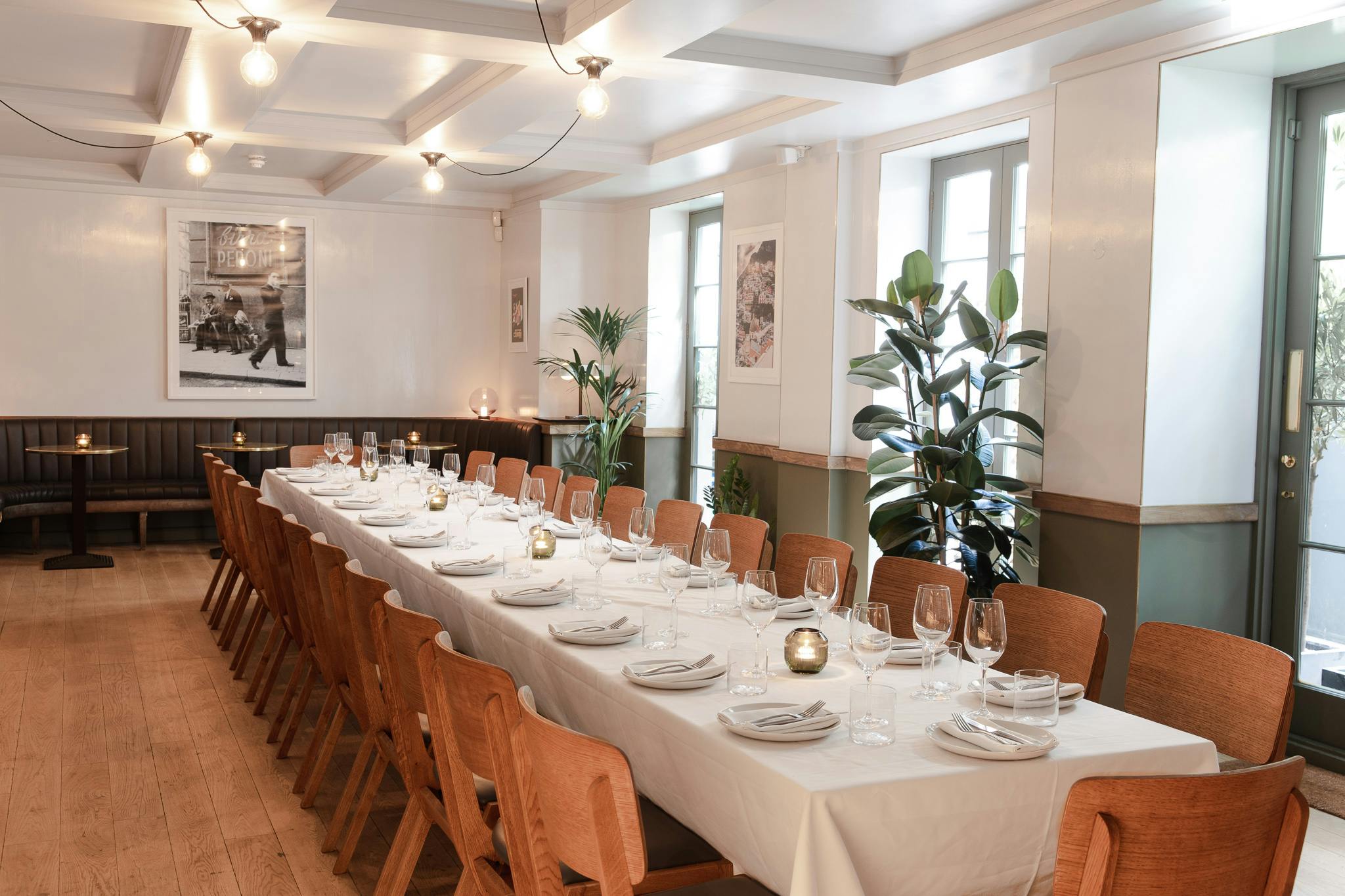 Elegant dining space in The Garden Room, perfect for corporate dinners and gatherings.