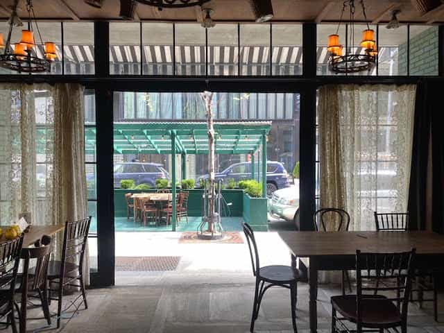 Gemma Wine Room at The Bowery Hotel, rustic tables, ideal for events and meetings.