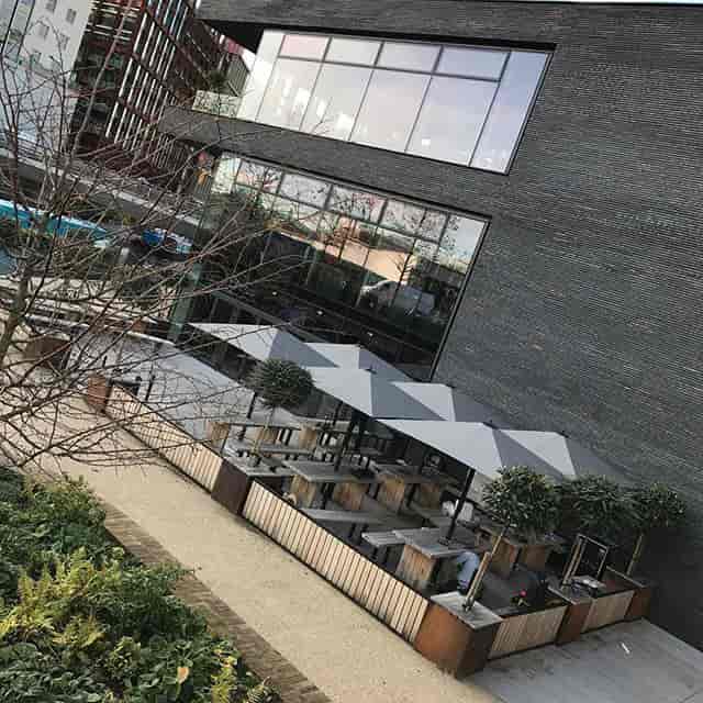 Modern outdoor event space at Canalside Bar & Terrace, ideal for networking and gatherings.
