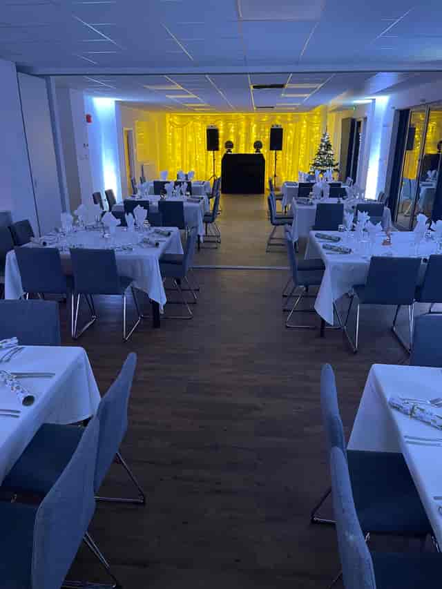 Elegant Waterside Suite dinner setup in Northampton for corporate events and weddings.