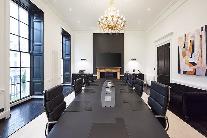 Master Boardroom at George House: sleek conference table for corporate meetings.