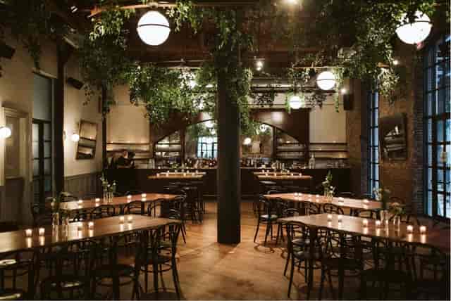 Main Hall & Garden Terrace at Wythe Hotel, rustic charm venue for events and gatherings.