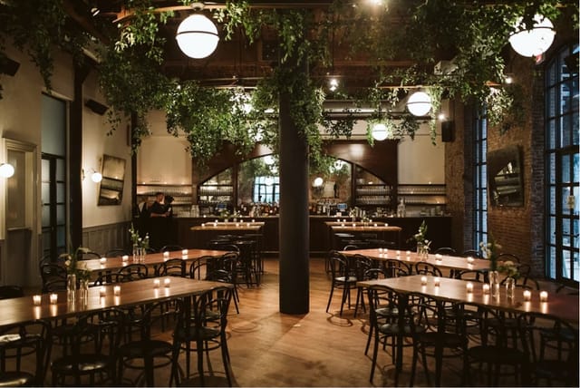 Main Hall & Garden Terrace at Wythe Hotel, rustic charm venue for events and gatherings.