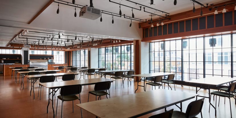 Versatile event space at Ace Hotel Brooklyn with natural light, ideal for workshops and meetings.