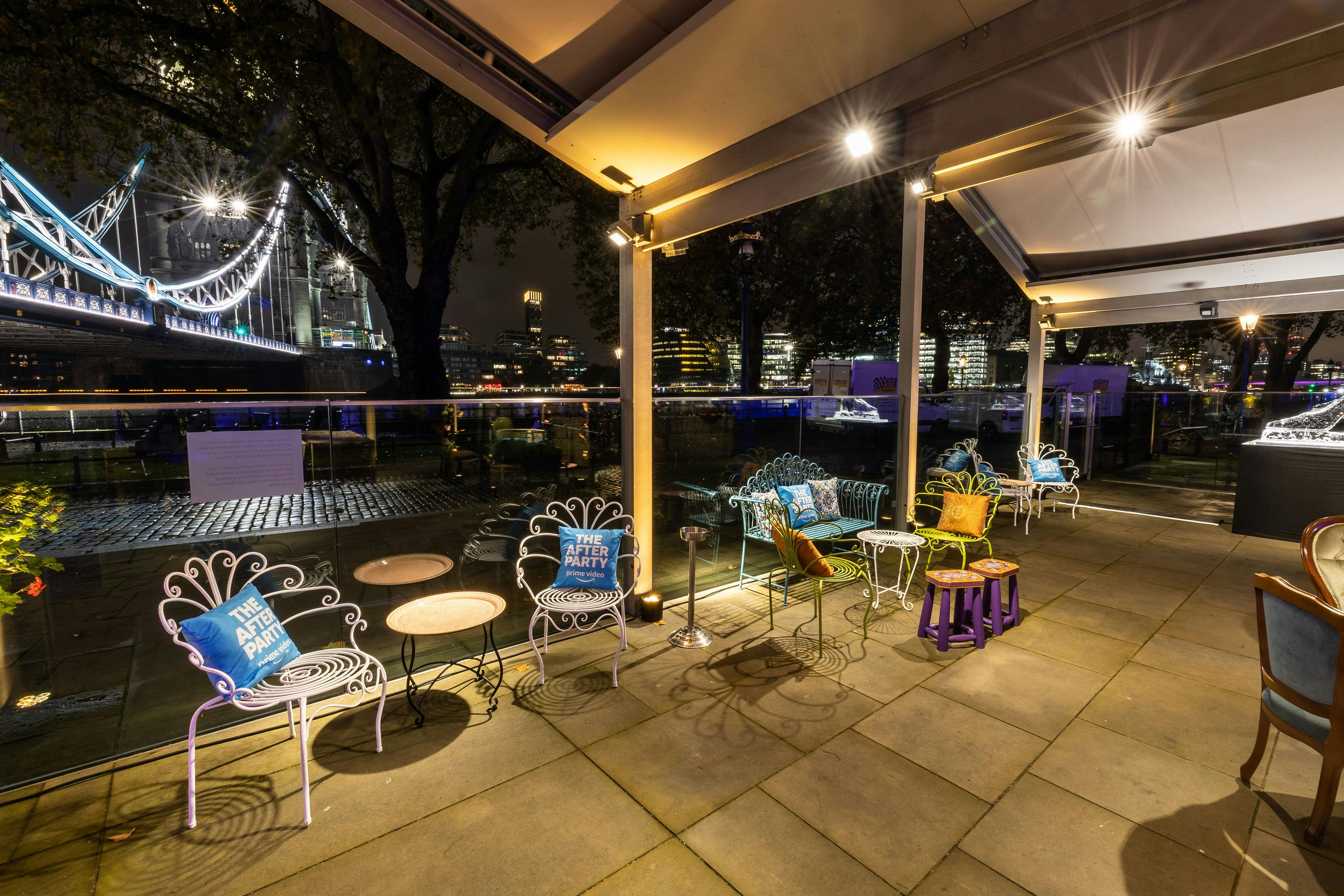 Stylish outdoor event space at HM Tower of London with elegant seating and ambient lighting.