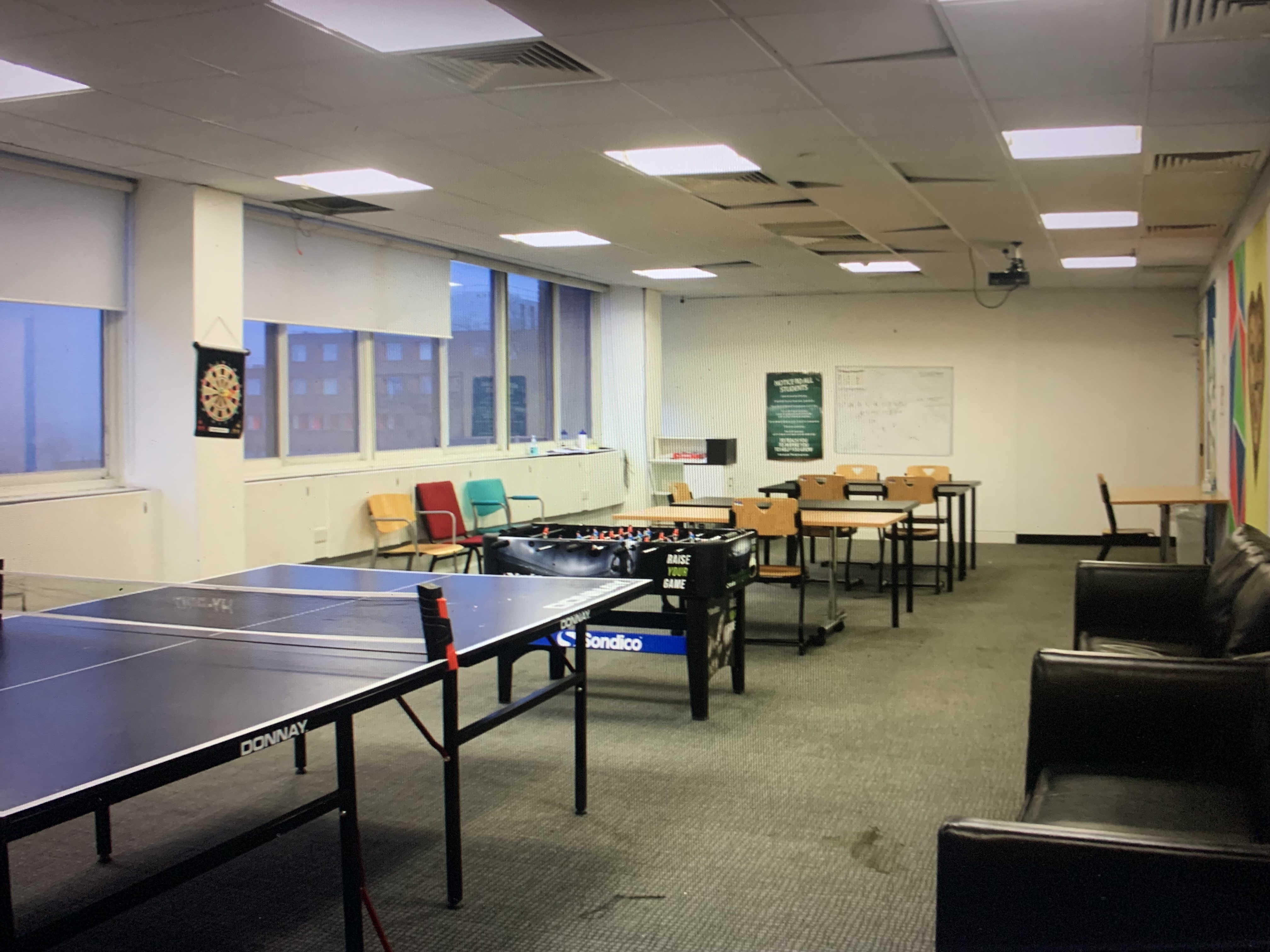 Versatile London Rangers meeting space with ping pong table for team-building events.