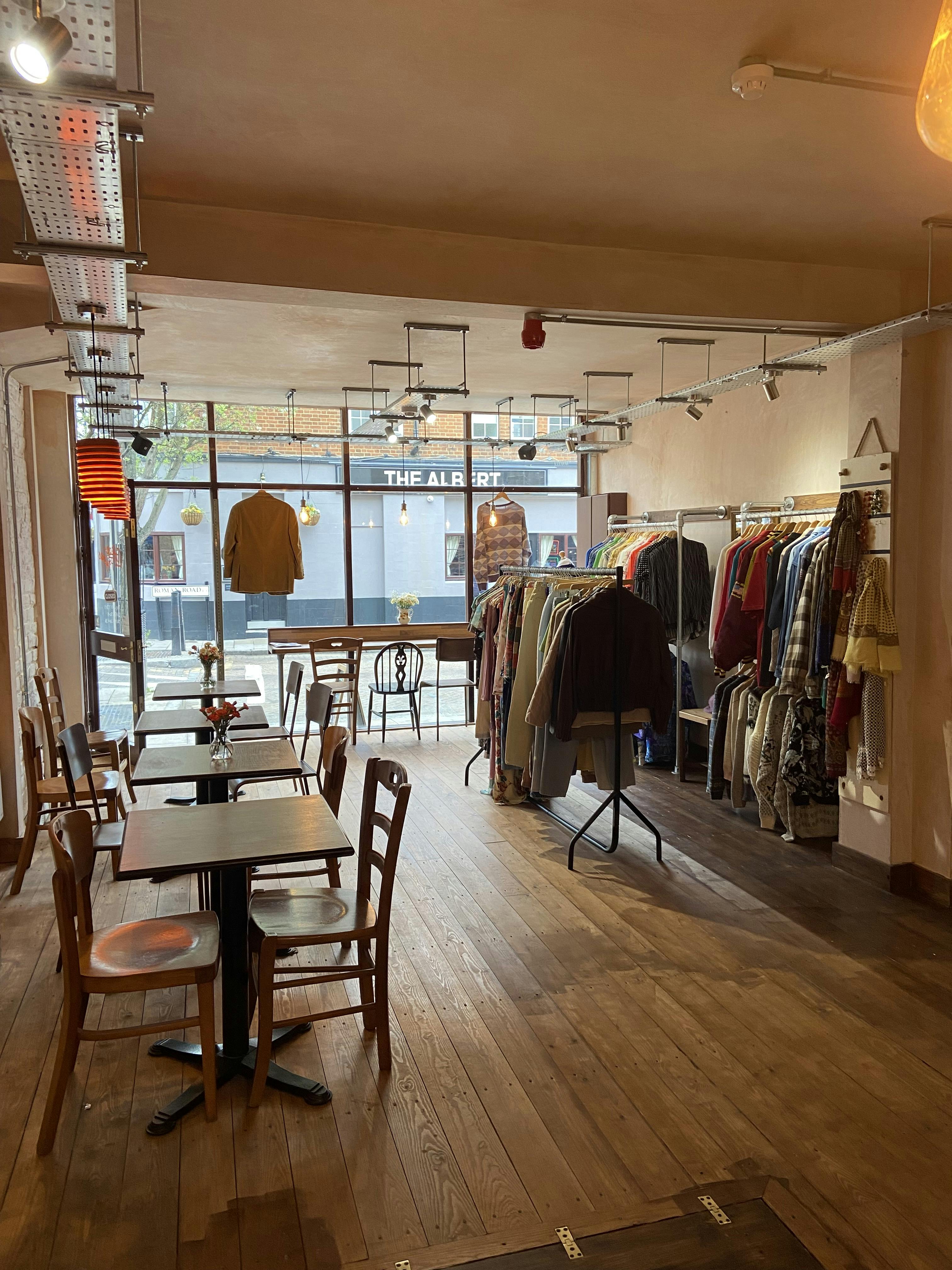 Cozy retail-dining space with stylish displays for pop-up events and workshops.